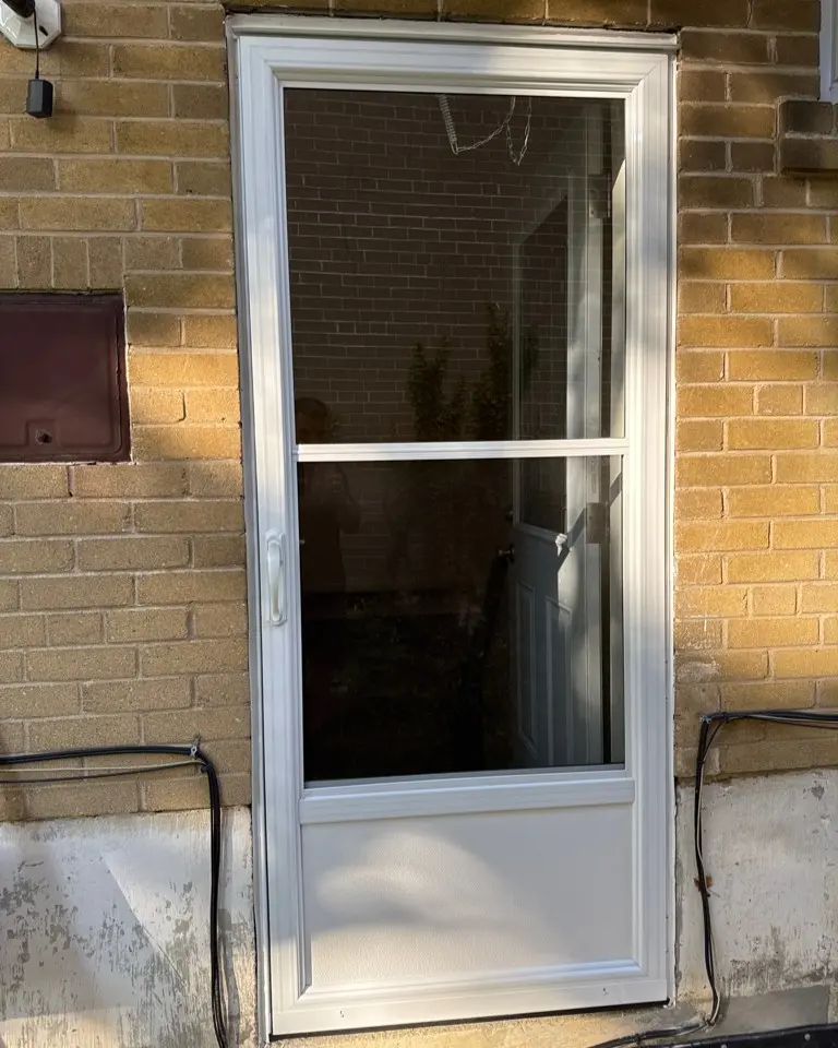 Storm door with screen insert installed in Etobicoke