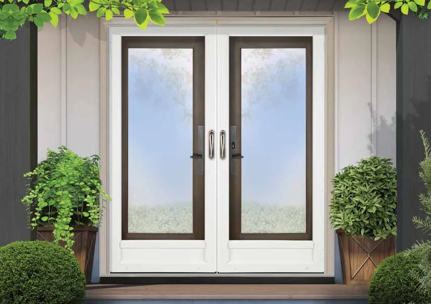 White aluminum storm doors installed at the front entrance of a Canadian home